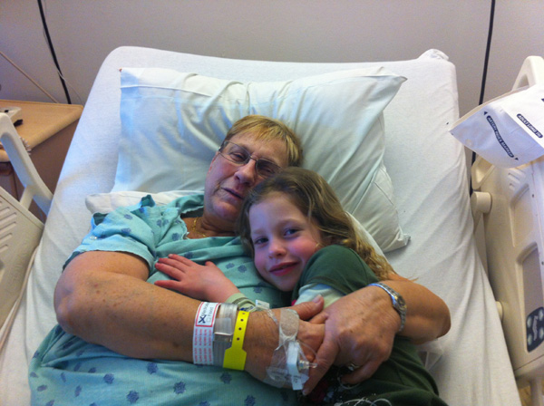 Tutu and Irene cuddling in the hospital